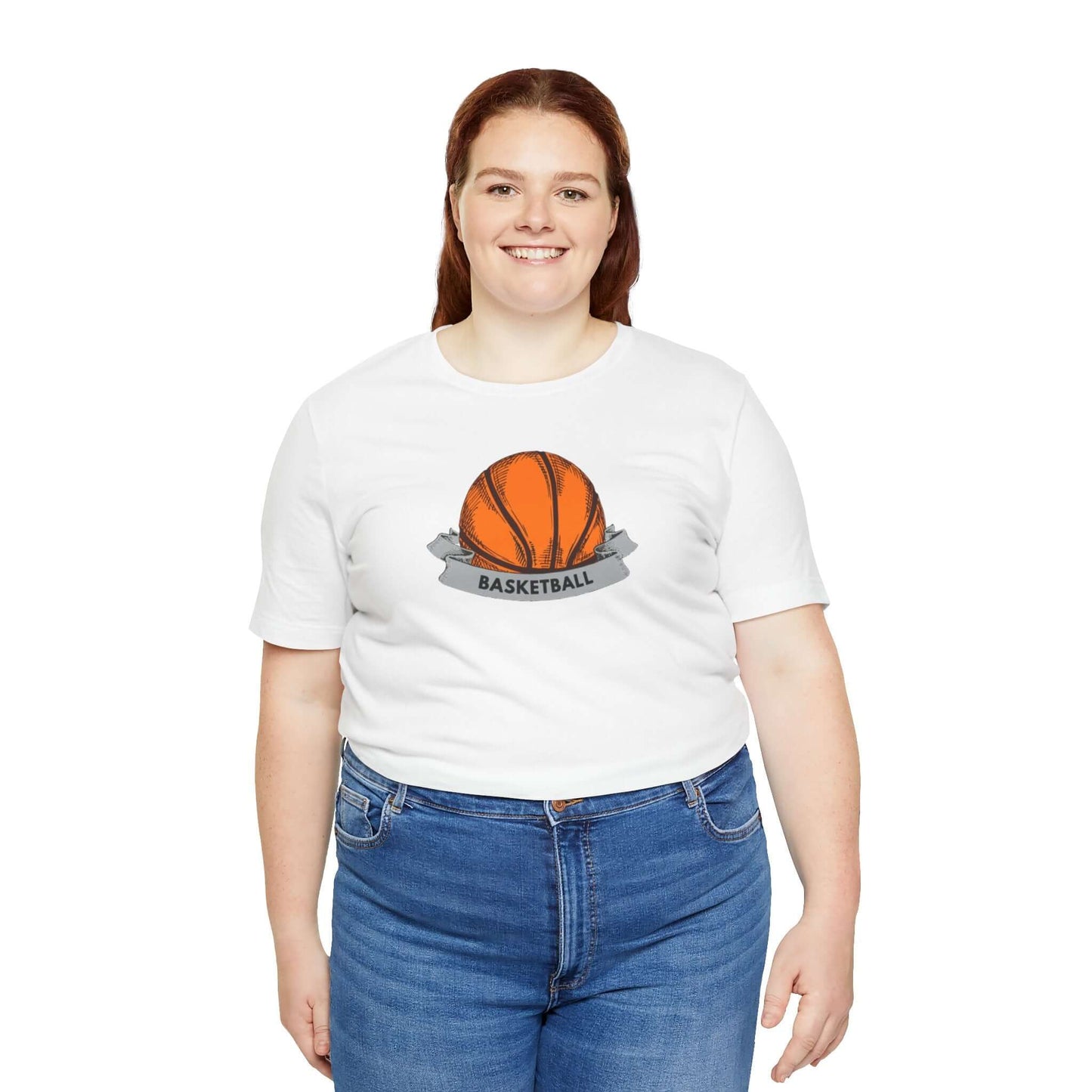 Woman wearing a unisex basketball jersey tee with a vibrant orange basketball graphic, perfect for sports enthusiasts.