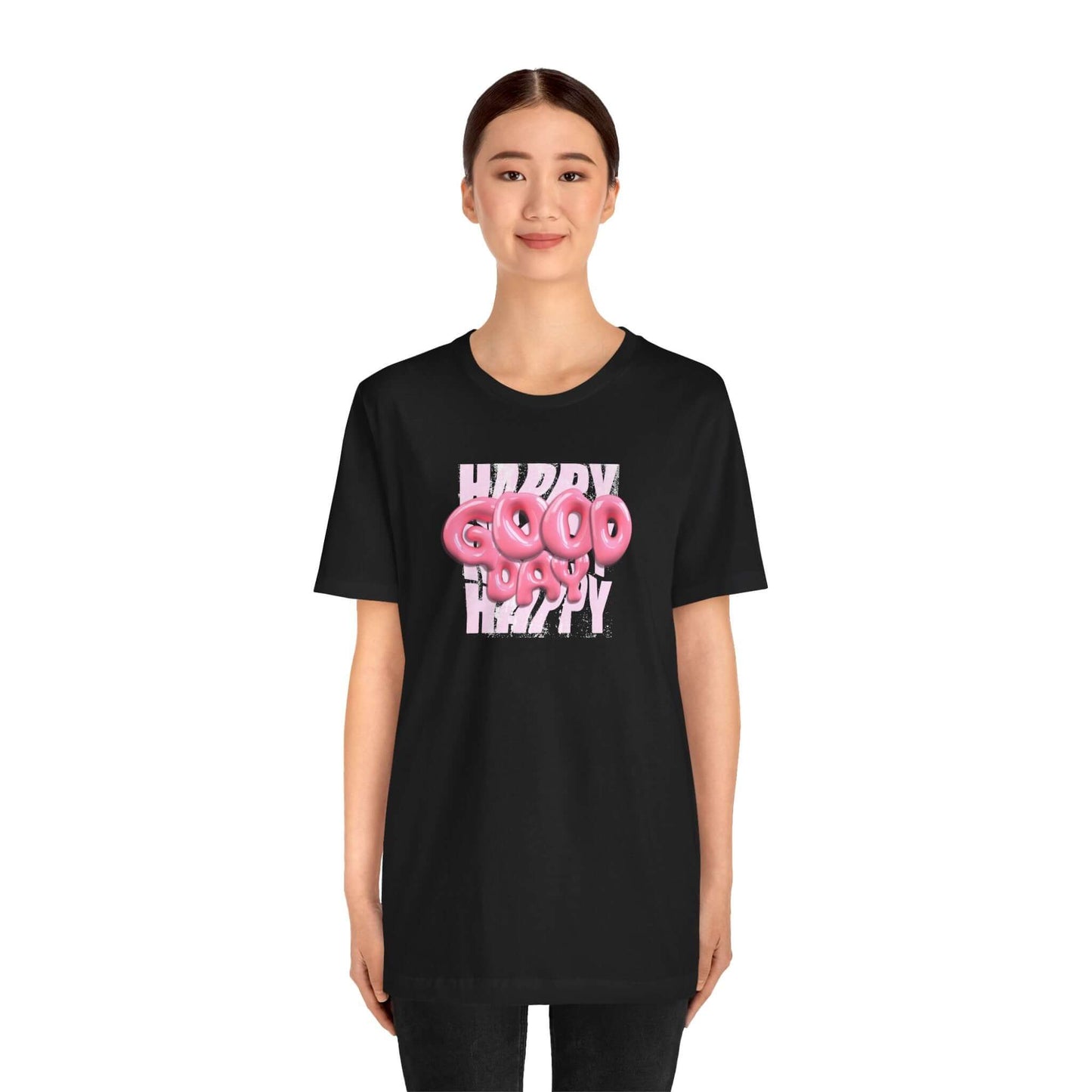 Model wearing a black Graphic Tee with a playful 'Happy Good Vibes' design, perfect for casual wear and parties.