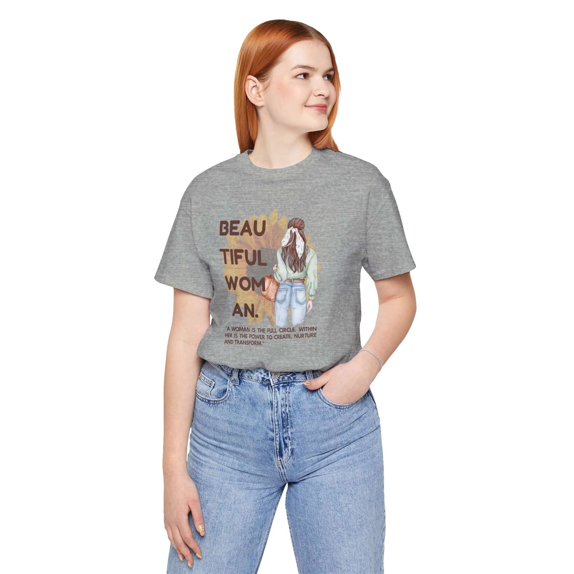 Model wearing a gray Positive Vibe Women's Tee featuring an inspirational graphic design.