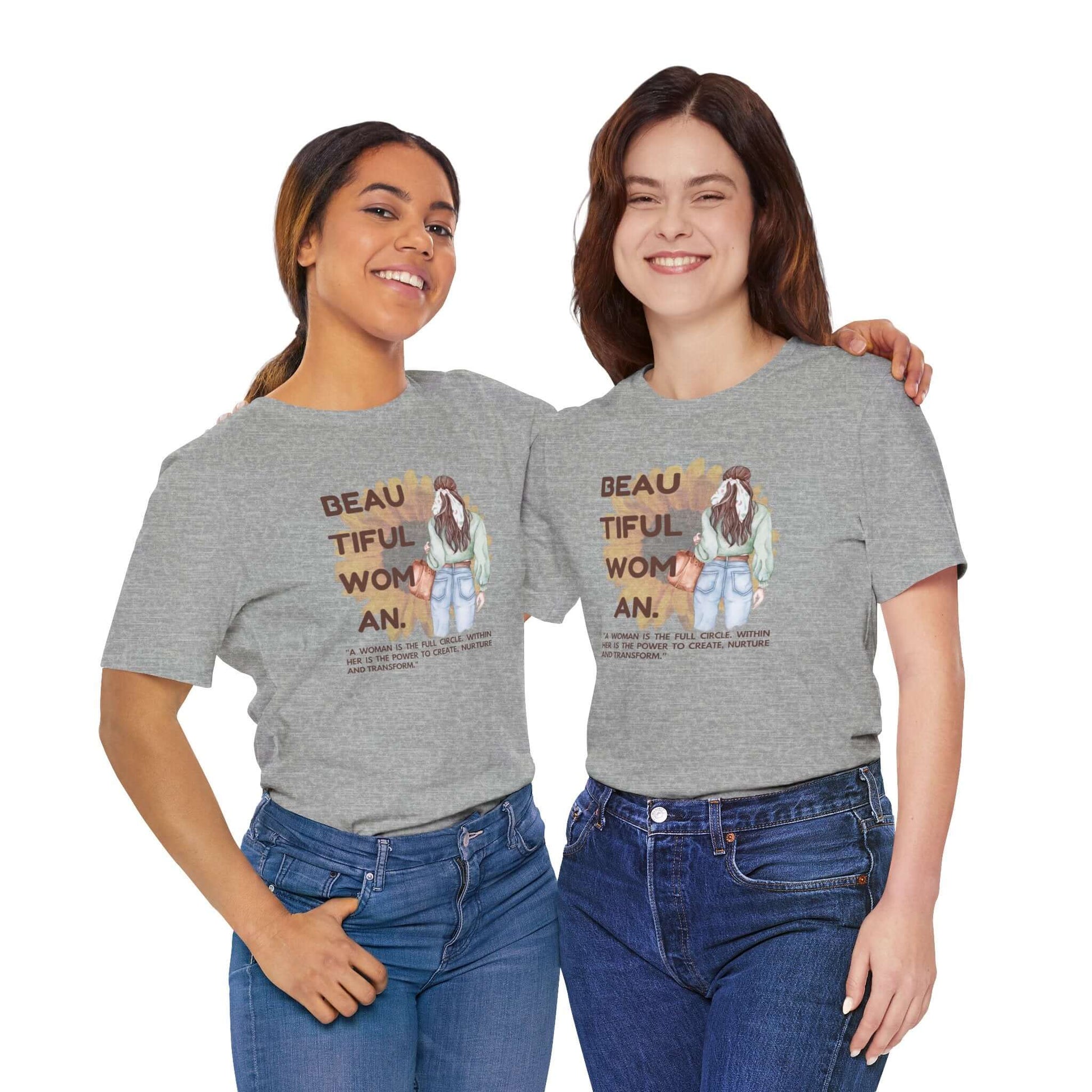 Two women wearing a gray Positive Vibe Women's Tee, showcasing stylish design and positive messaging, perfect for casual wear.