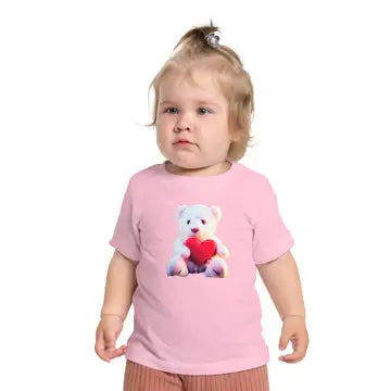 Toddler in a pink tee featuring a cute teddy bear holding a heart, perfect for playful kids' fashion.