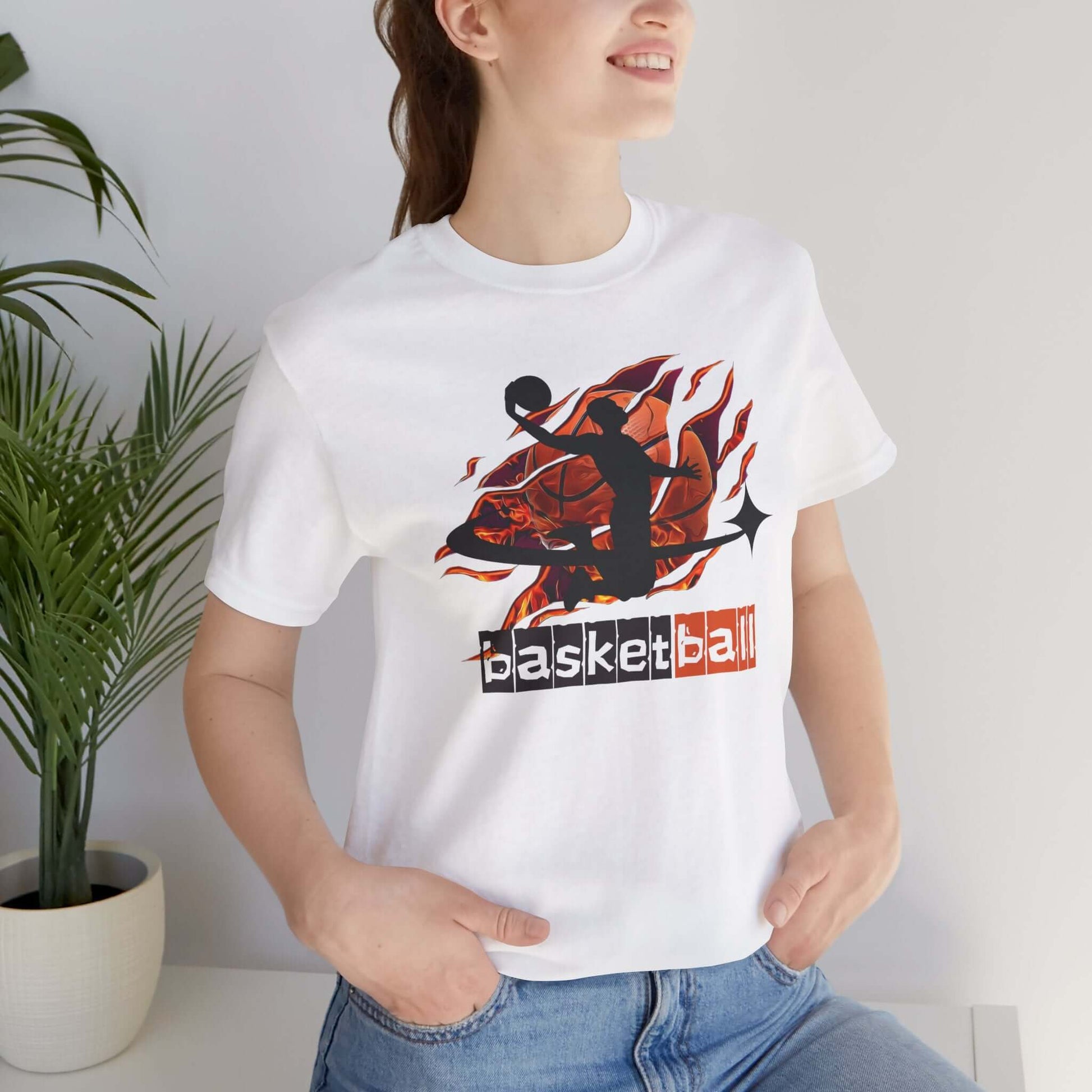 Woman wearing a Basketball Graphic Tee, showcasing stylish design with a basketball silhouette and vibrant colors.