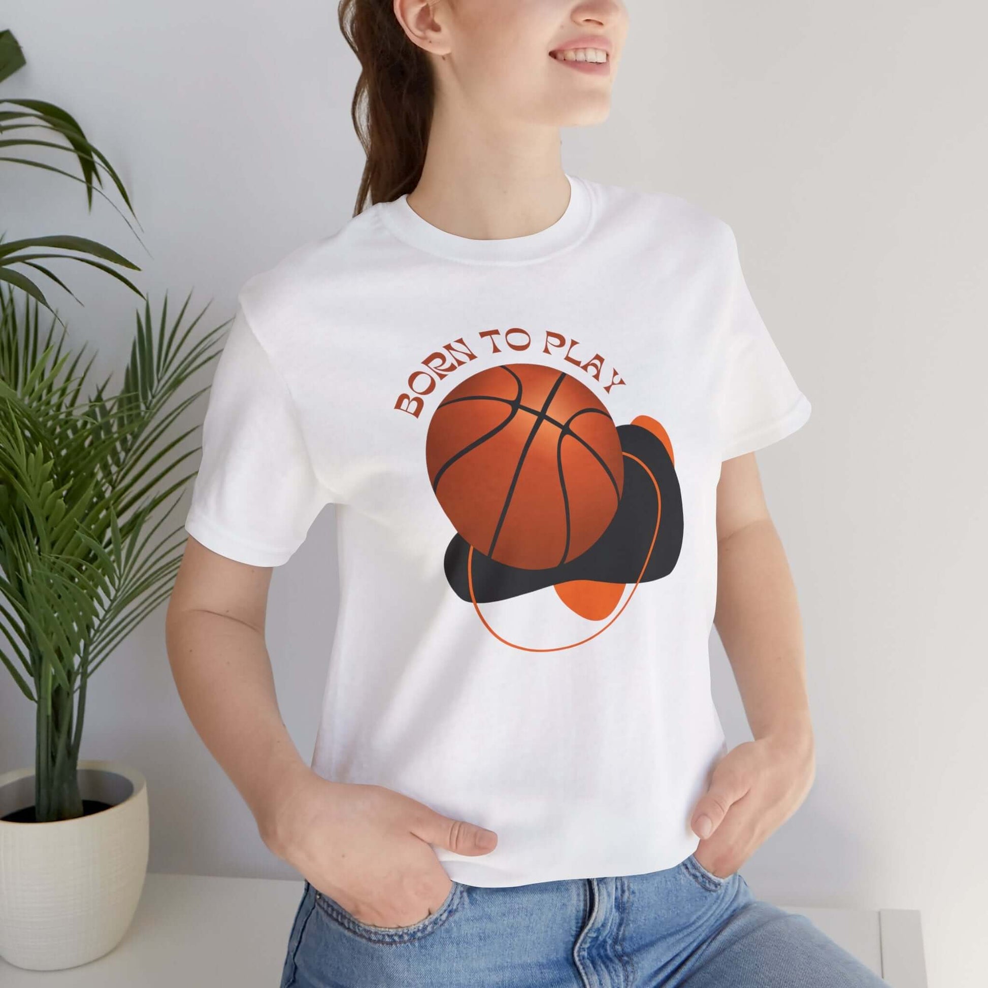 Model wearing the Basketball Lover's Unisex Tee with 'Born to Play' print, perfect for sports enthusiasts.