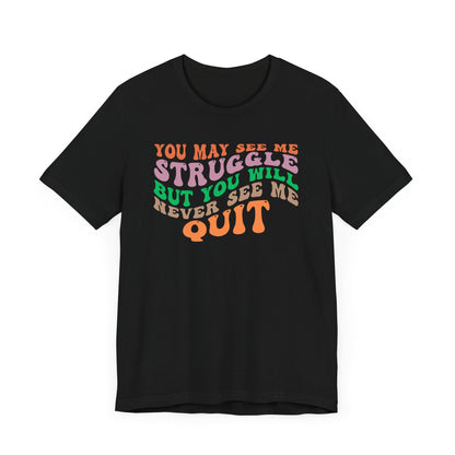 Camiseta unisex motivacional: PUEDES VERME LUCHAR, PERO NUNCA ME VERÁS RENUNCIAR